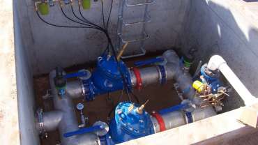 Parallel valves at a pressure station