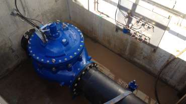 A blue flow control valve